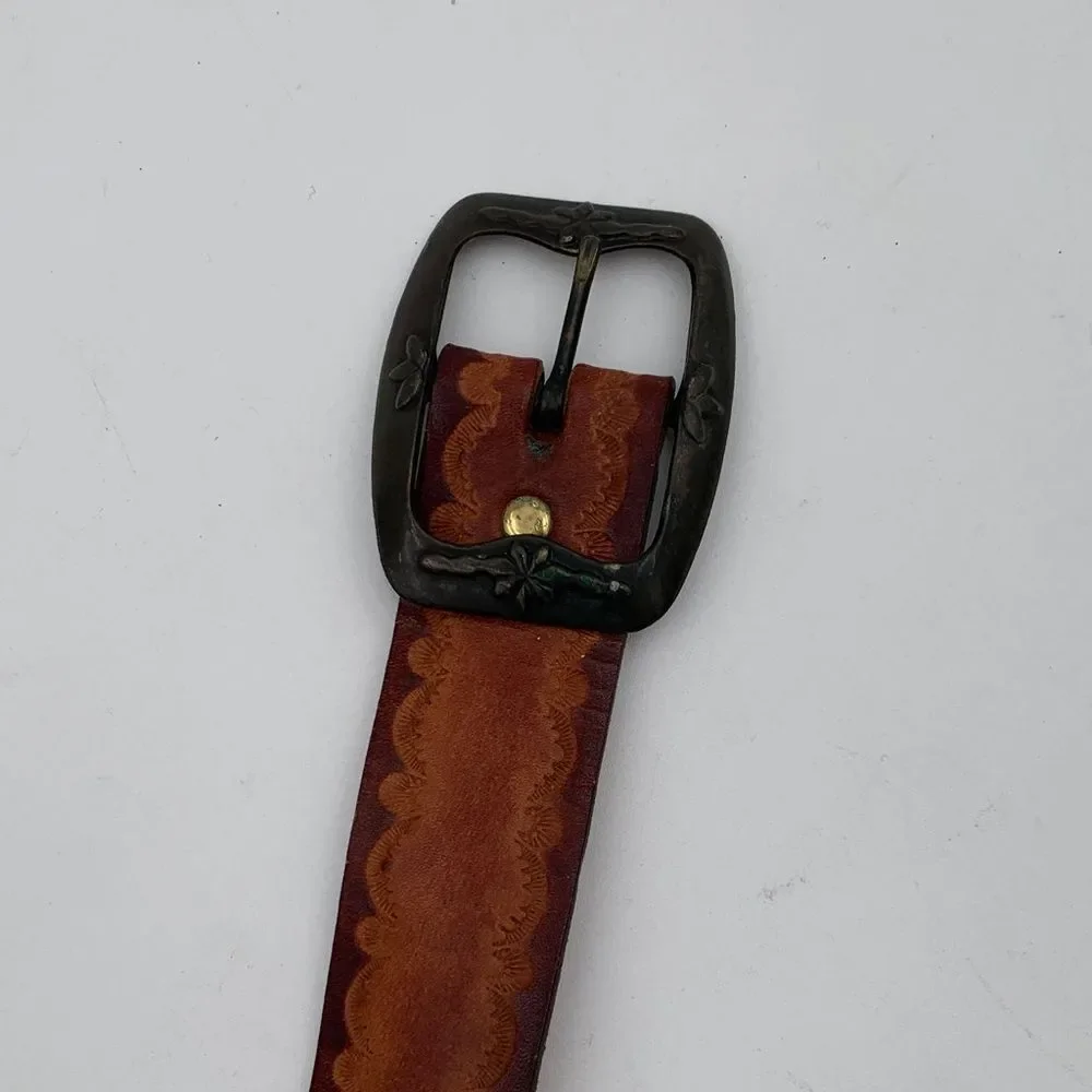 Brown Leather western style belt with braided leather and denim.
